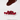 Chocolate vertiéndose sobre arándanos rojos deshidratados, mostrando un momento clave del proceso de recubrimiento en Mysuplify.