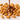 Maní confitado cubierto con chocolate con leche, imagen decorativa utilizada en la tienda online mysuplify en Chile para representar mezcla crujiente y dulce.