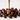 Pasas oscuras bañadas con chocolate con leche, imagen decorativa utilizada en la tienda online mysuplify en Chile para representar mezcla de frutas deshidratadas y chocolate.